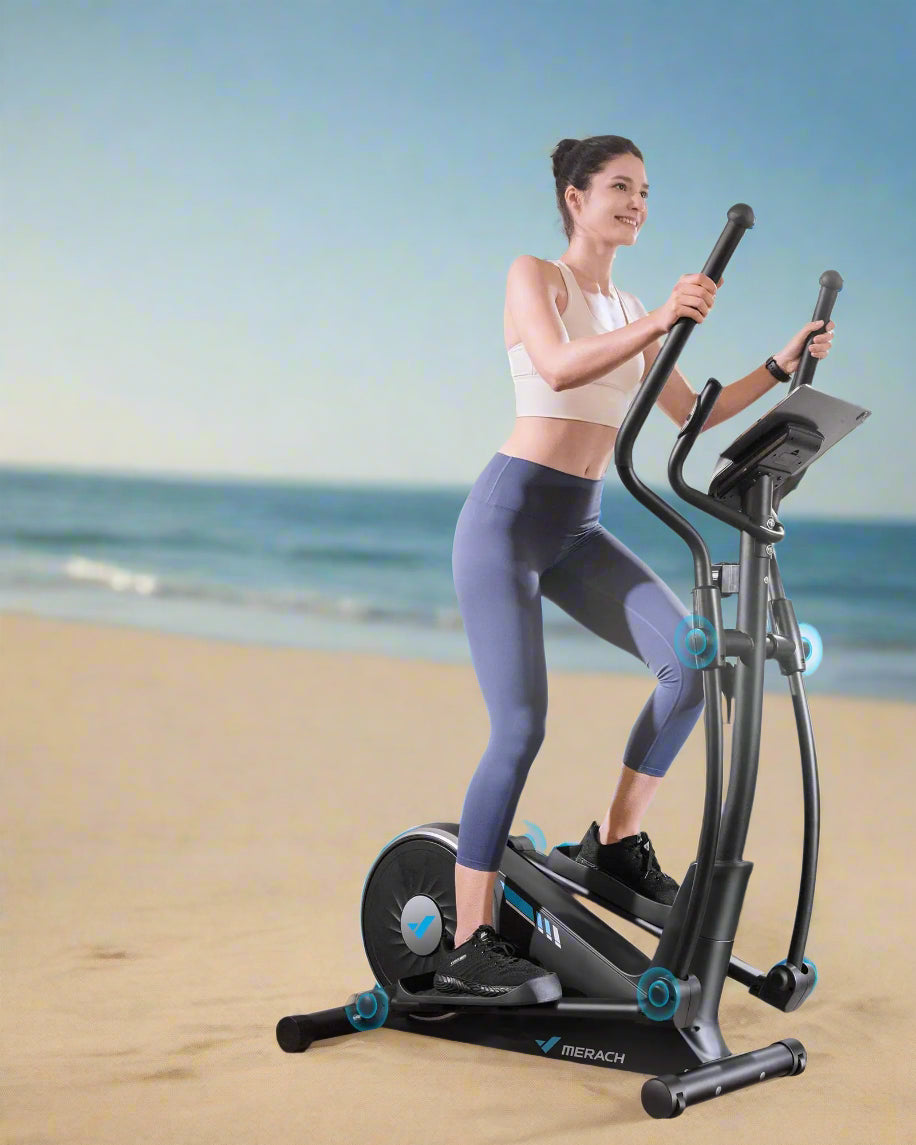 woman using elliptical machine at the beach