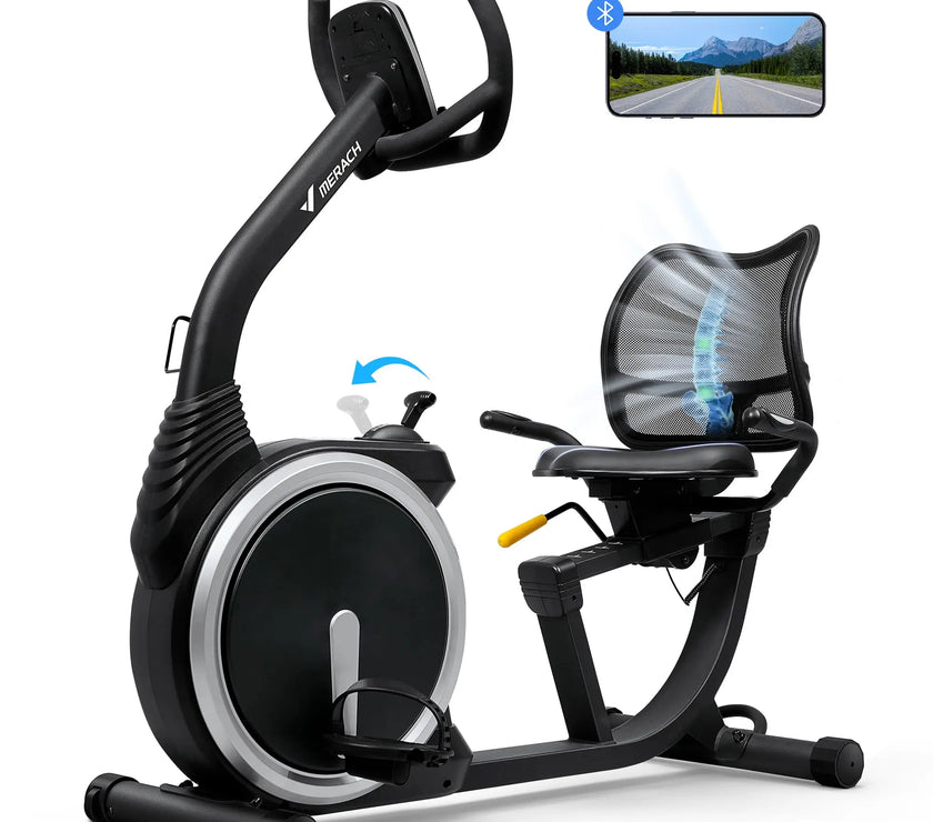 An image showing a recumbent exercise bike with a woman standing next to it. The bike is black with a comfortable seat, frosted handlebars, and a heart rate monitor.