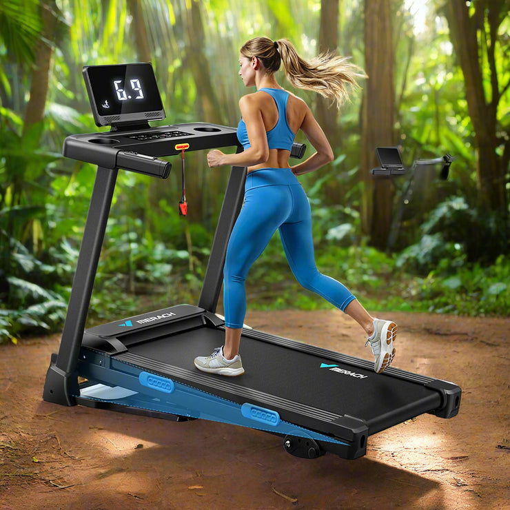 A woman is running on a black electric treadmill with a blue and gray frame, which is foldable and has Bluetooth connectivity. The treadmill has a display showing heart rate data and an app icon, emphasizing its smart fitness features.