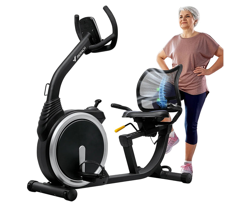An image showing a recumbent exercise bike with a woman standing next to it. The bike is black with a comfortable seat, frosted handlebars, and a heart rate monitor.