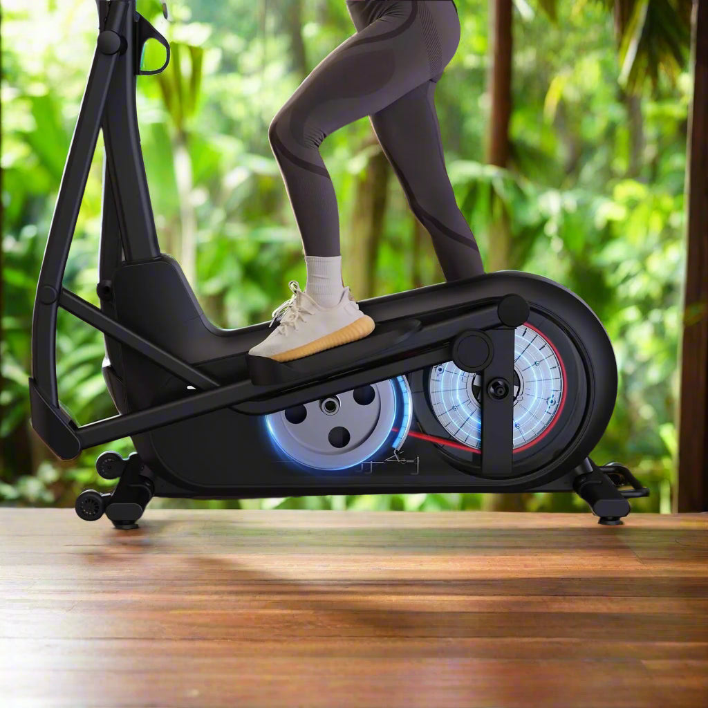 Woman using elliptical machine