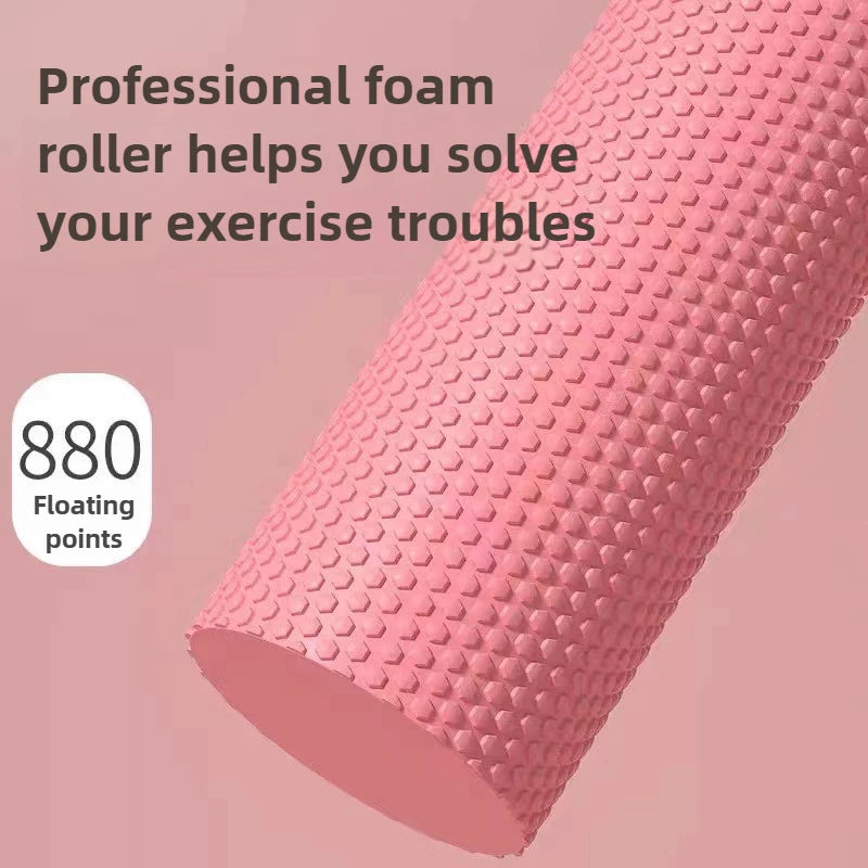 Pink foam roller with text on a pink background