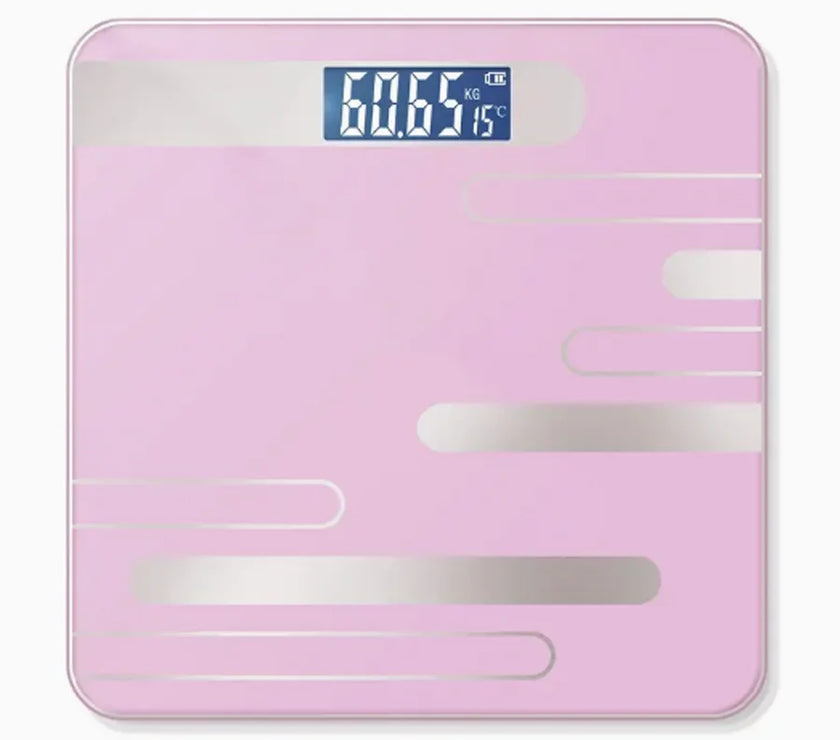 Pink digital bathroom scale with a digital display on a white background