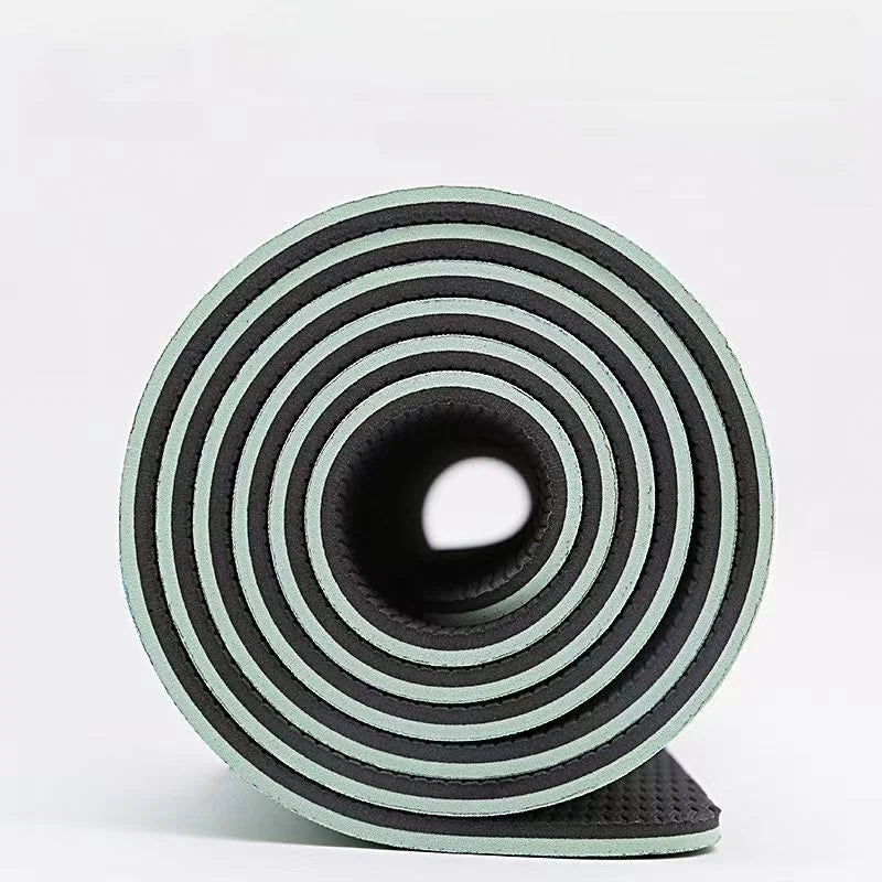 Roll of black and gray foam tape on a white background