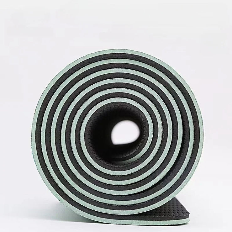 Roll of black and gray foam tape on a white background