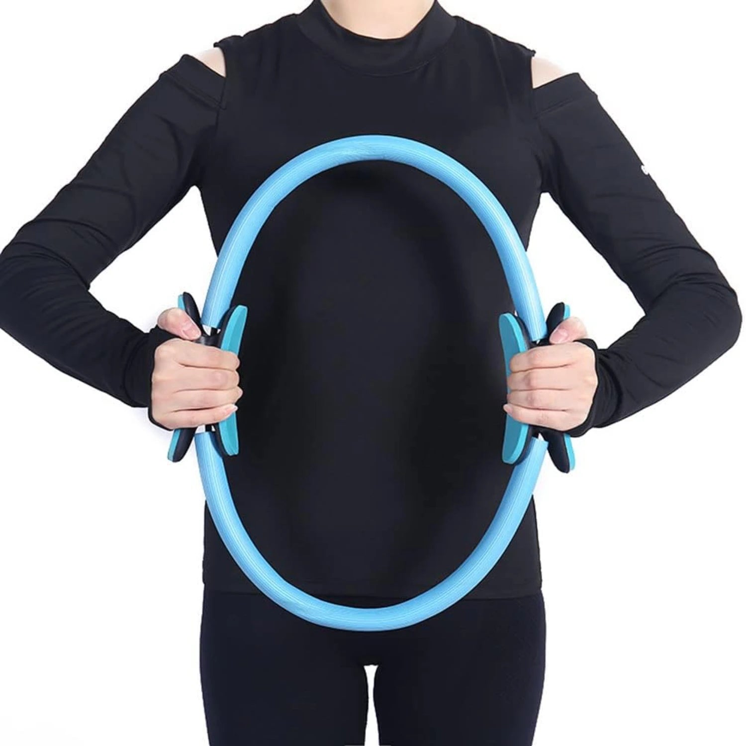 Person wearing a black outfit holding a blue exercise hoop against a white background