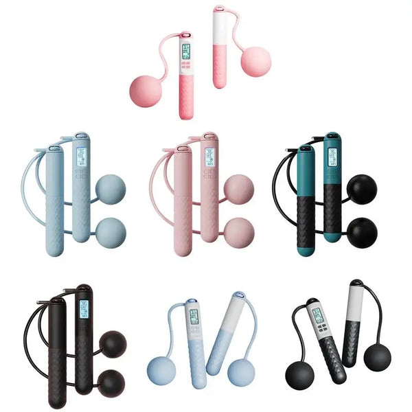 Collection of jump ropes with digital displays in various colors on a white background