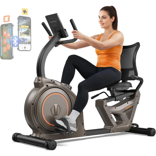A woman sitting on a magnetic recumbent exercise bike with an LCD monitor and heart rate handle. The bike has a gray and orange color scheme, and there is a graphic encouraging viewers to pay attention to shops and get coupons.