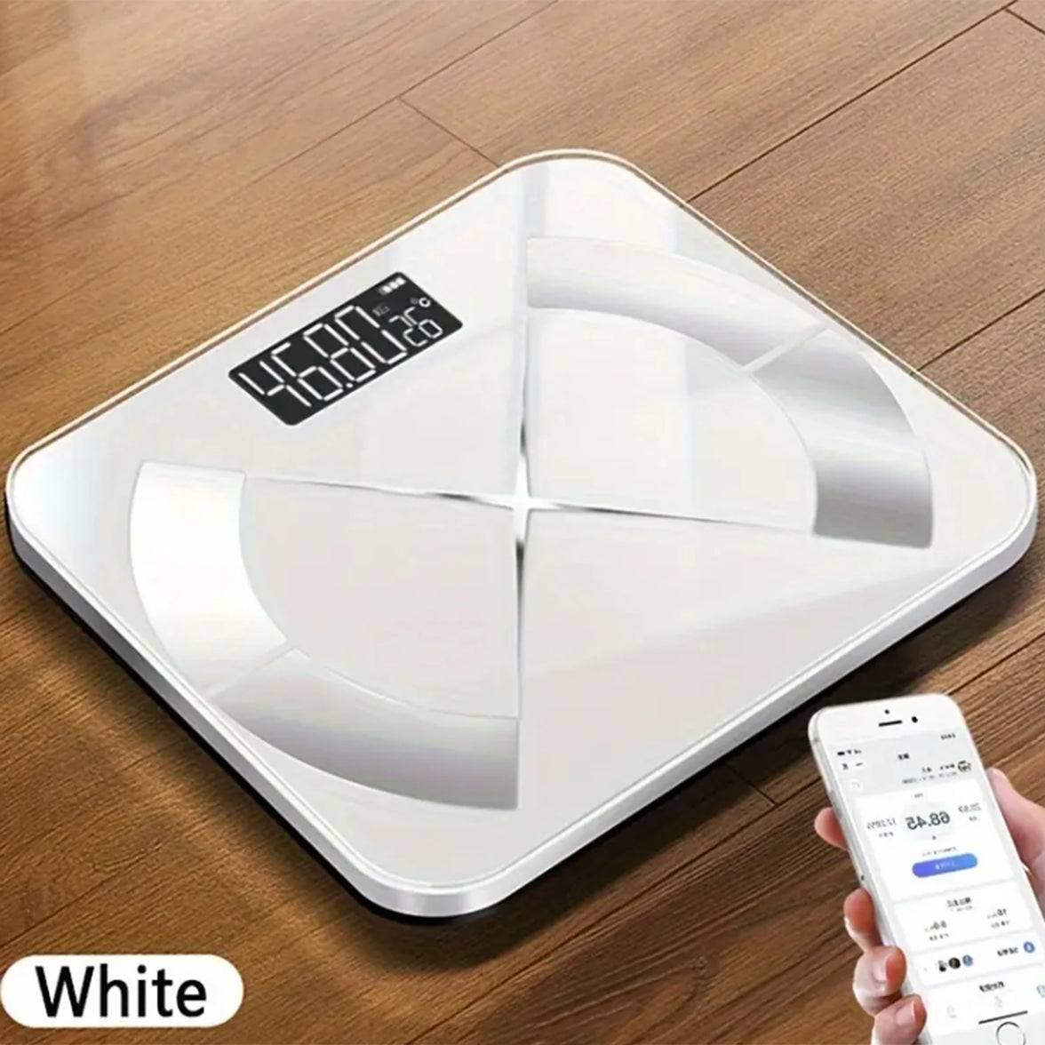 White digital bathroom scale on a wooden floor with a smartphone displaying app.