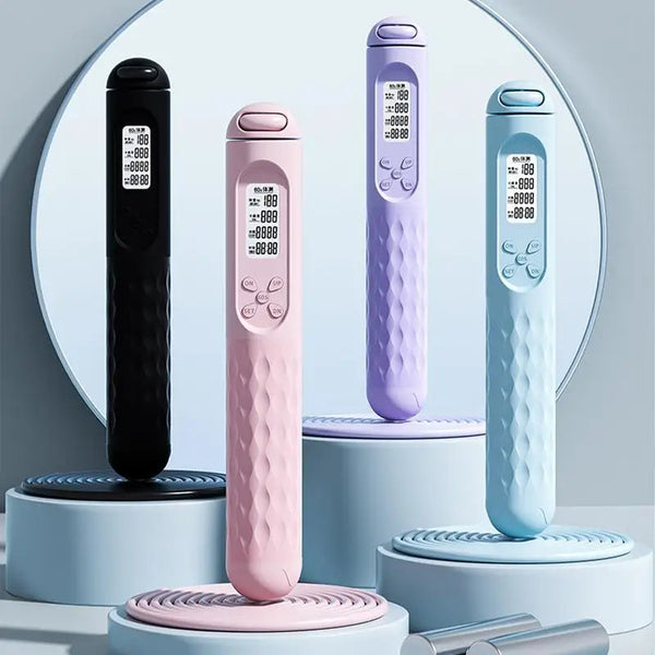 Four electronic devices with digital displays on a light blue background