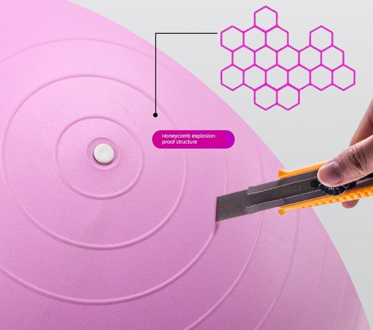 Purple silicone mat with honeycomb pattern and a hand holding a knife