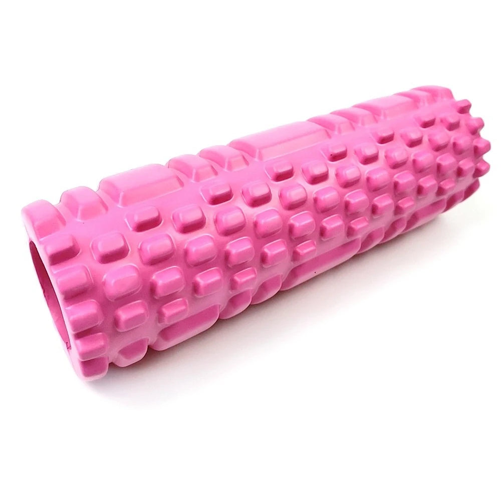 Pink foam roller on a white background