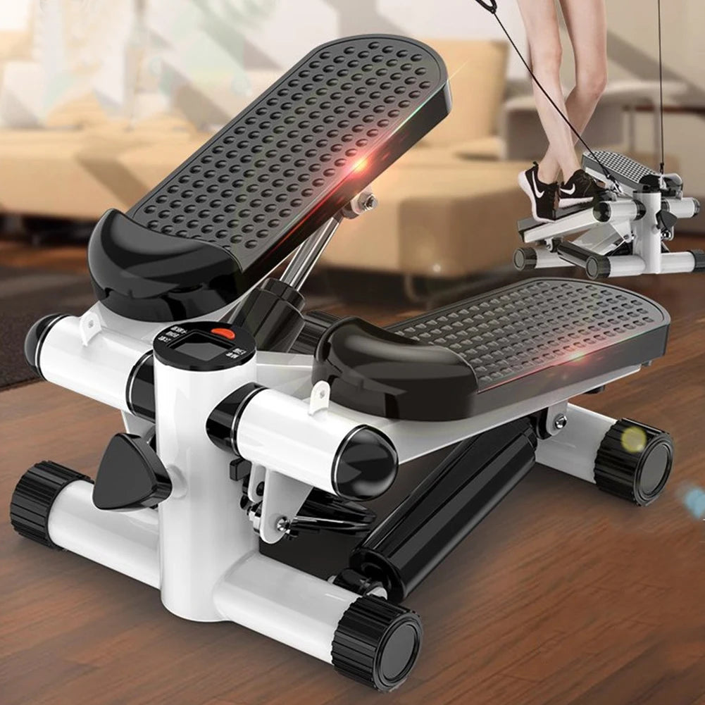 Mini step machine on a wooden floor with a blurred background
