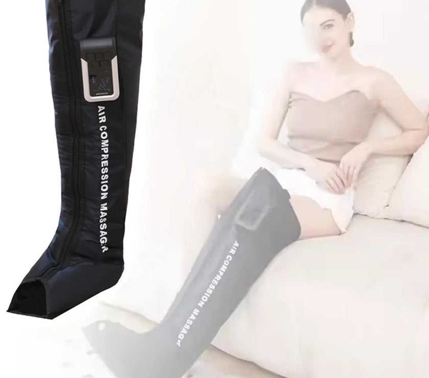 Air compression massage boot with a woman sitting on a couch in the background