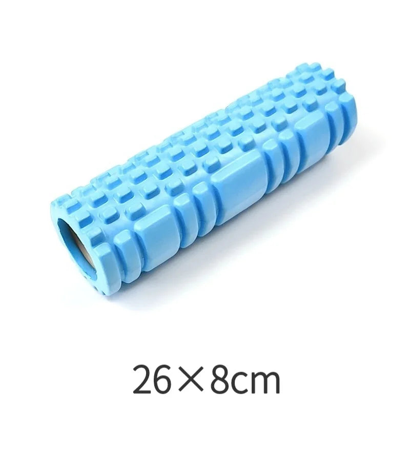 Blue foam roller with textured surface on a white background