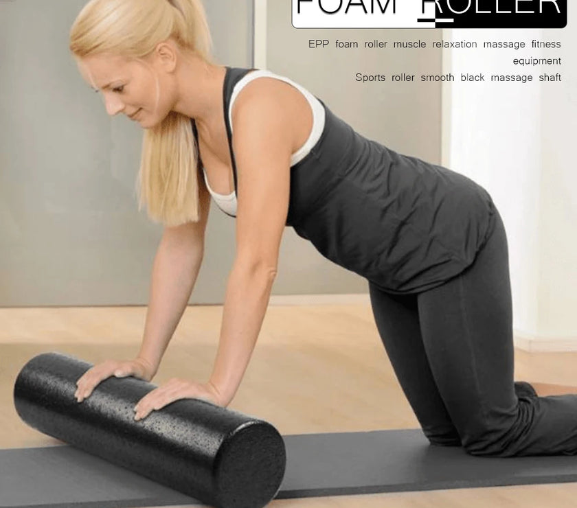 Woman using a foam roller on a mat with text about foam rollers.