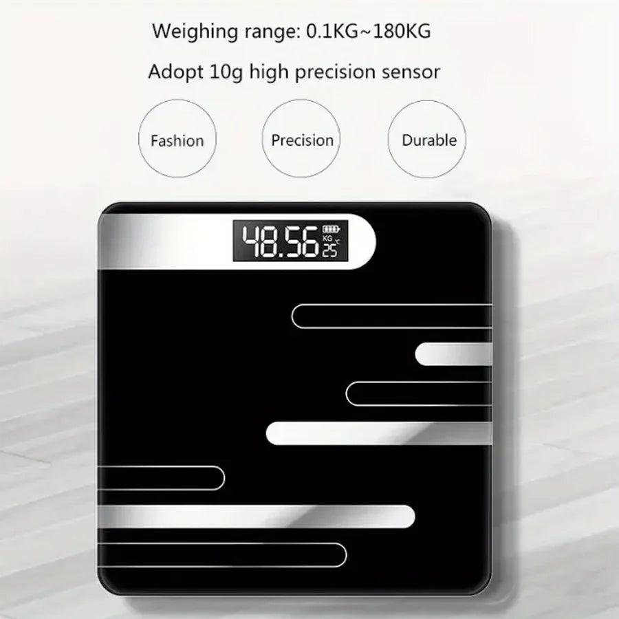 Black digital bathroom scale with digital display on a light gray background