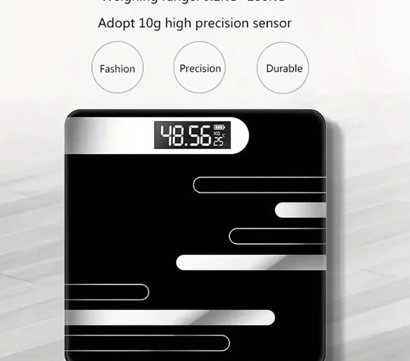 Black digital bathroom scale with digital display on a light gray background