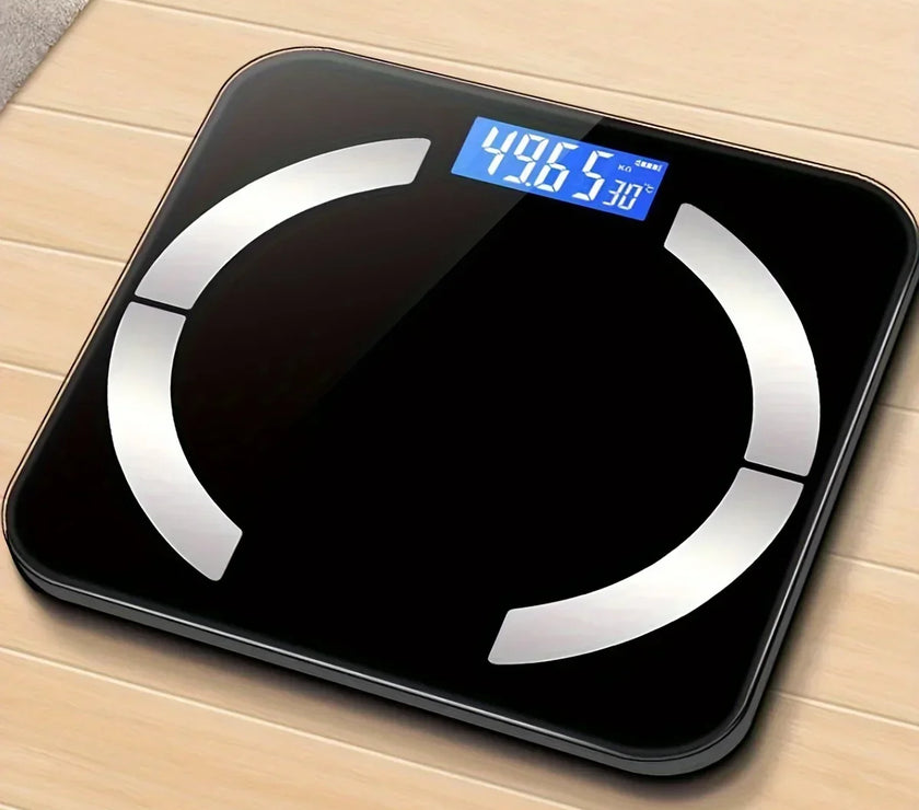 Digital body fat scale on a wooden floor