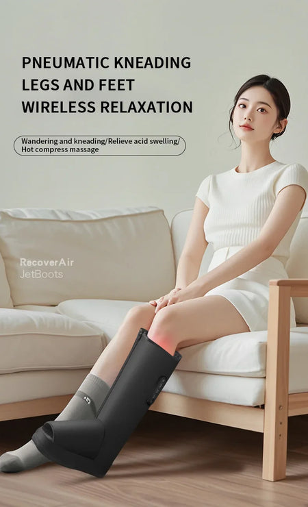 Woman using pneumatic knee-high boots for relaxation on a couch, with 'RecoverAir' branding.