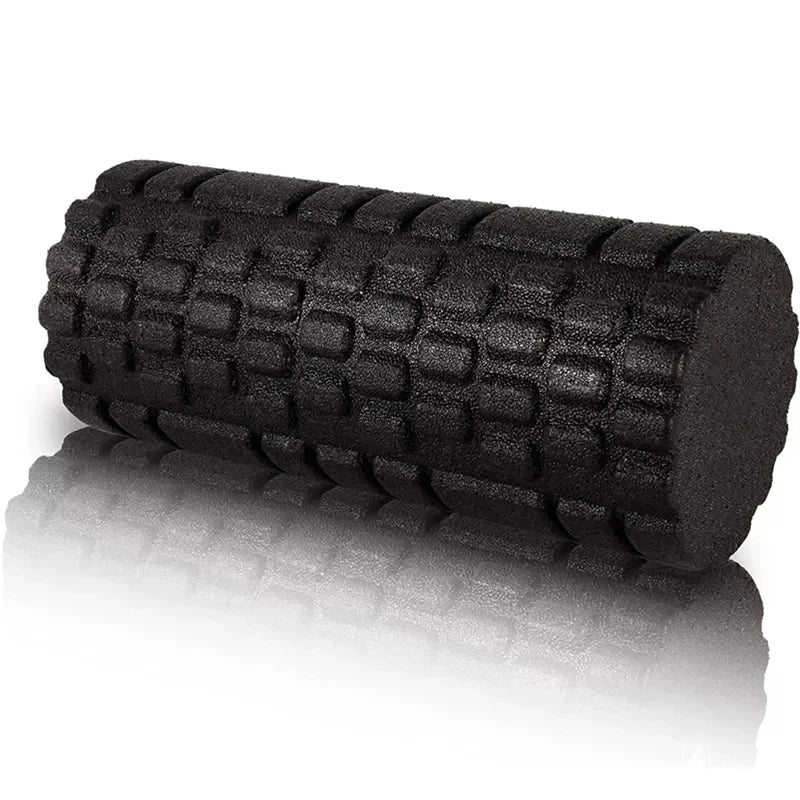 Black textured foam roller on a white background