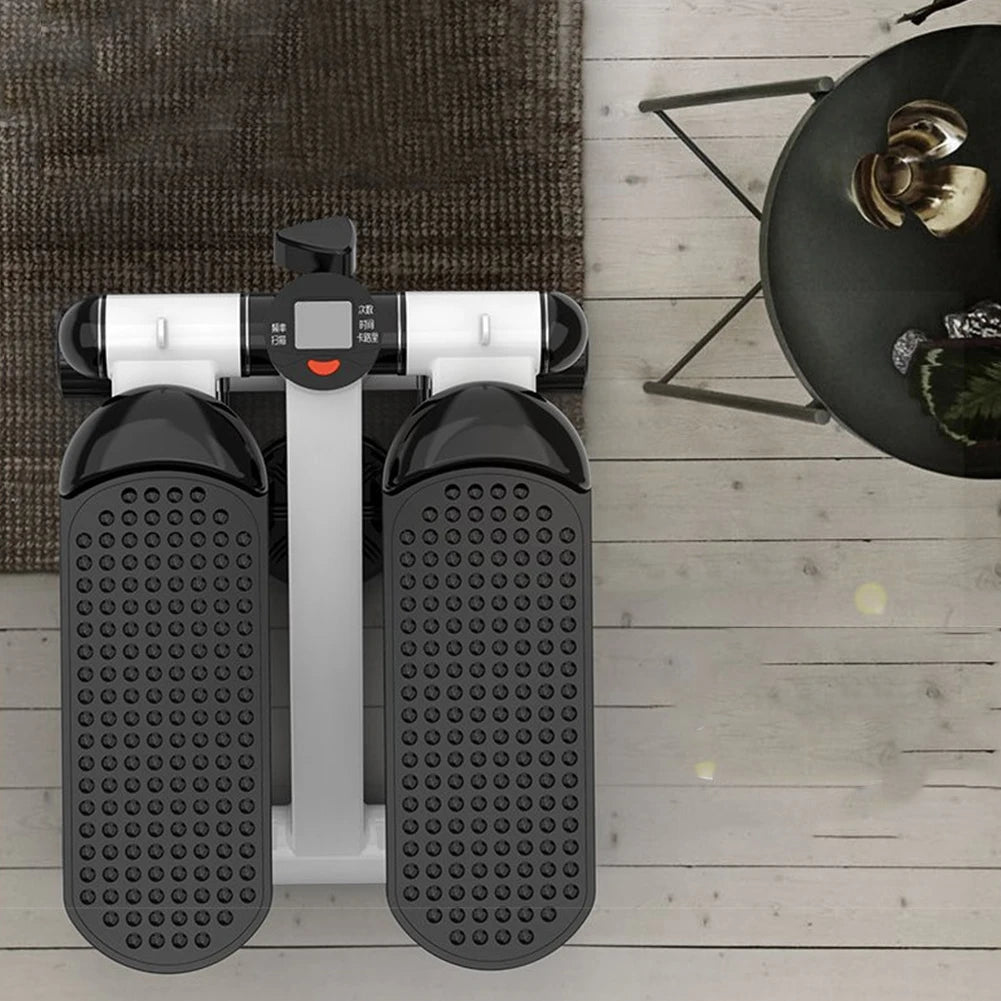 Step machine on a wooden floor with a rug and chair in the background