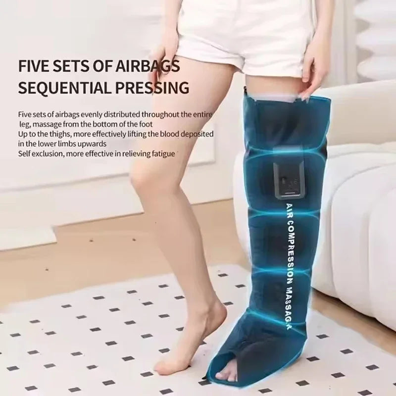 Person wearing a blue air compression massage device on one leg in a room.
