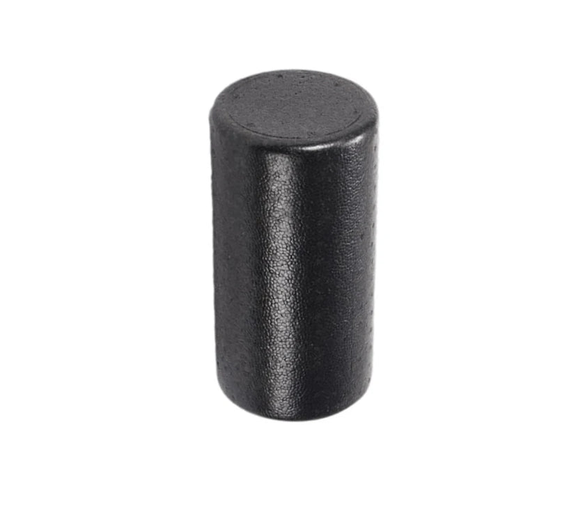 Black cylindrical object on a white background