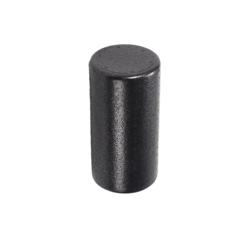 Black cylindrical object on a white background