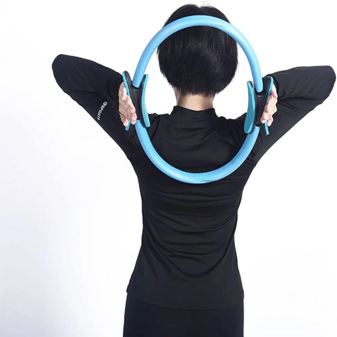 Person using a blue exercise hoop against a white background