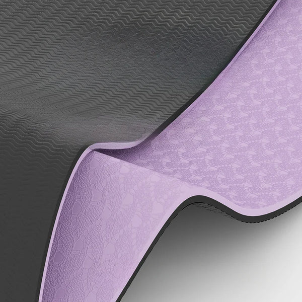 Close-up of a purple and black textured mat corner