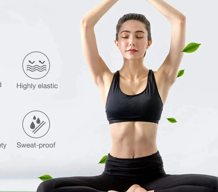 Woman in black athletic wear performing a yoga pose on a green mat with text about TPE material.