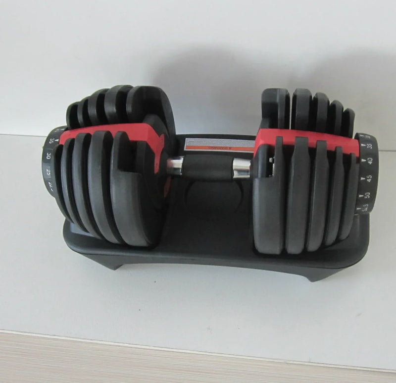 Adjustable dumbbell on a white surface