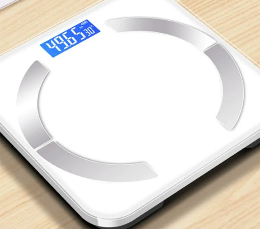 Digital scale displaying weight on a wooden surface