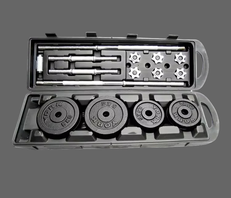 Dumbbell barbell set in a gift box with weight plates on a gray background