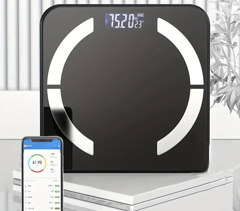 Black digital bathroom scale with smartphone displaying app on a white surface.