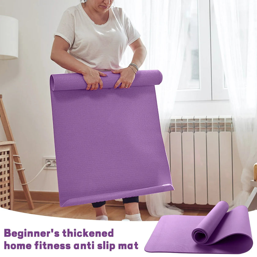 Person holding a purple thickened home fitness anti-slip mat in a room.
