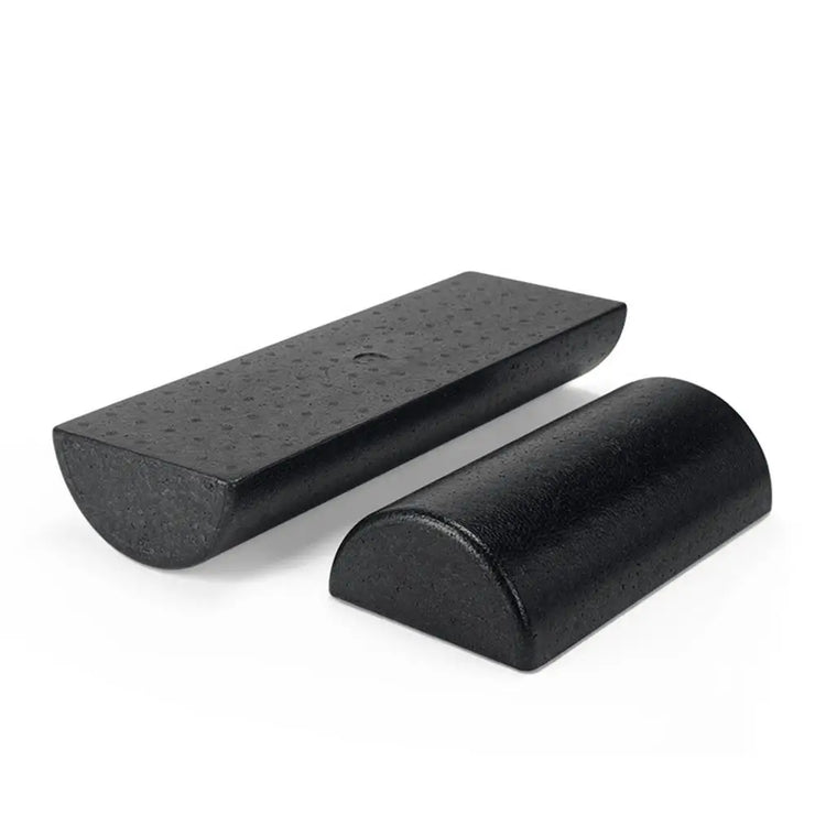 Two black wedge-shaped objects on a white background