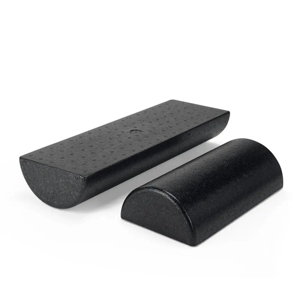 Two black wedge-shaped objects on a white background