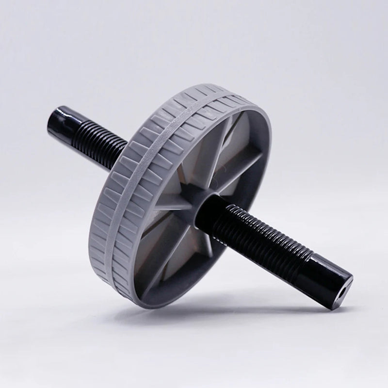 Gray and black ab roller on a light gray background