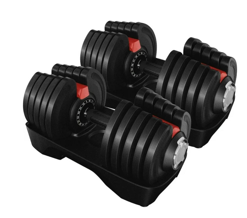 Pair of adjustable dumbbells on a white background