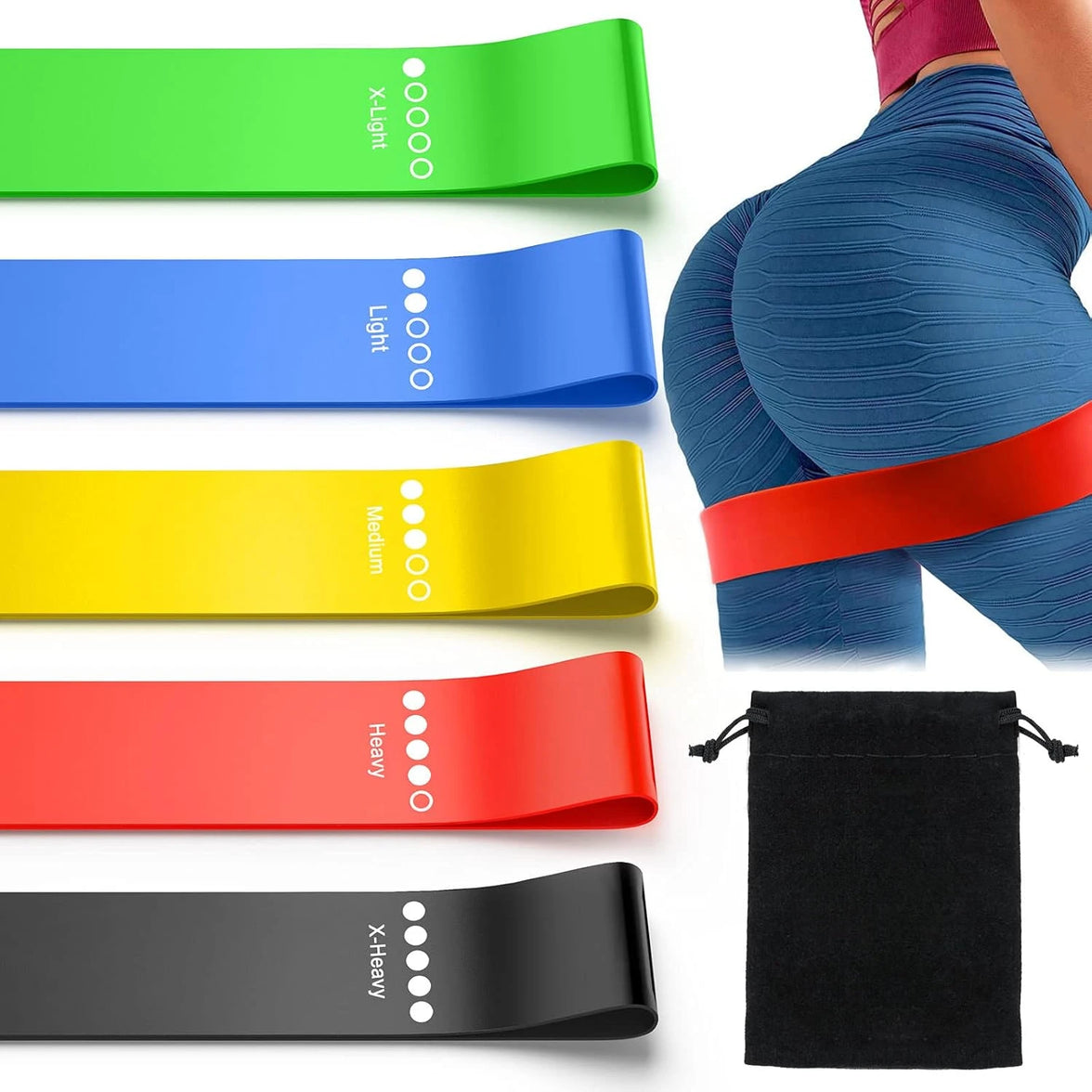 Set of resistance bands in various colors with a person wearing a blue band.