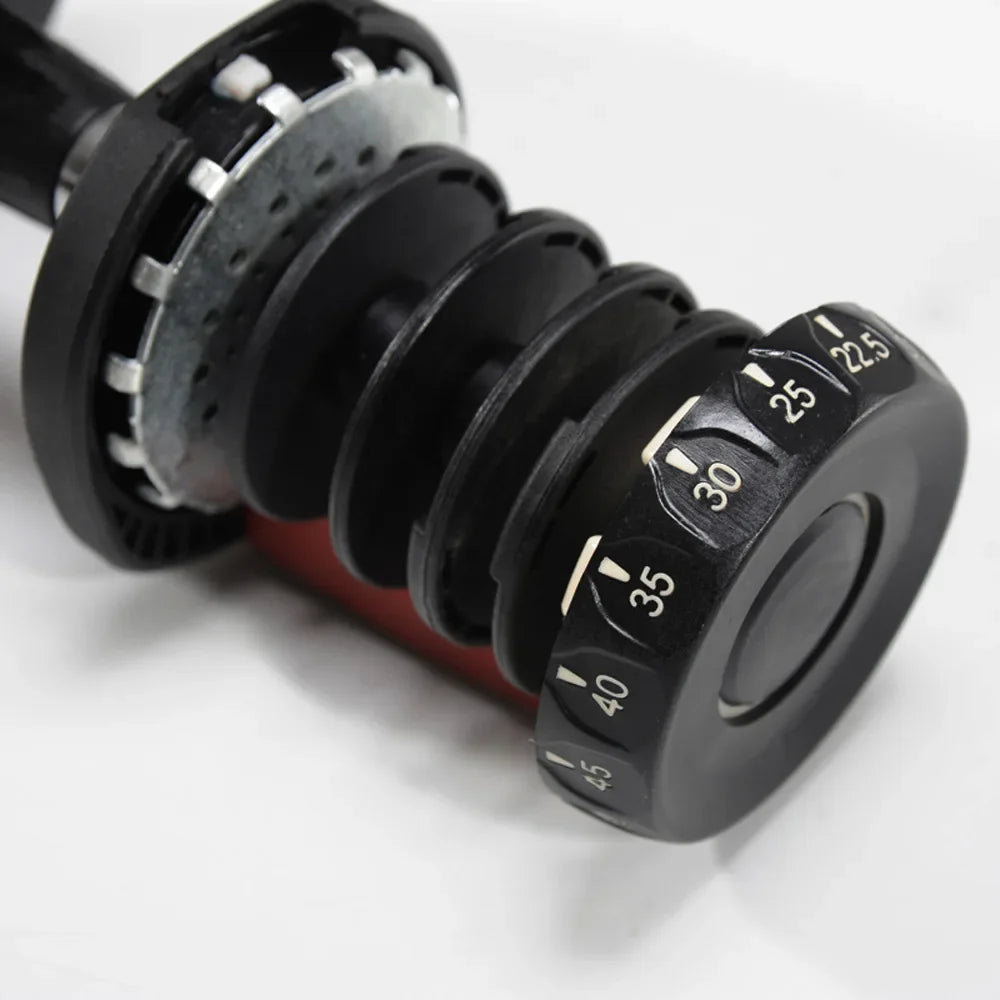 Black adjustable dumbbell on a white background