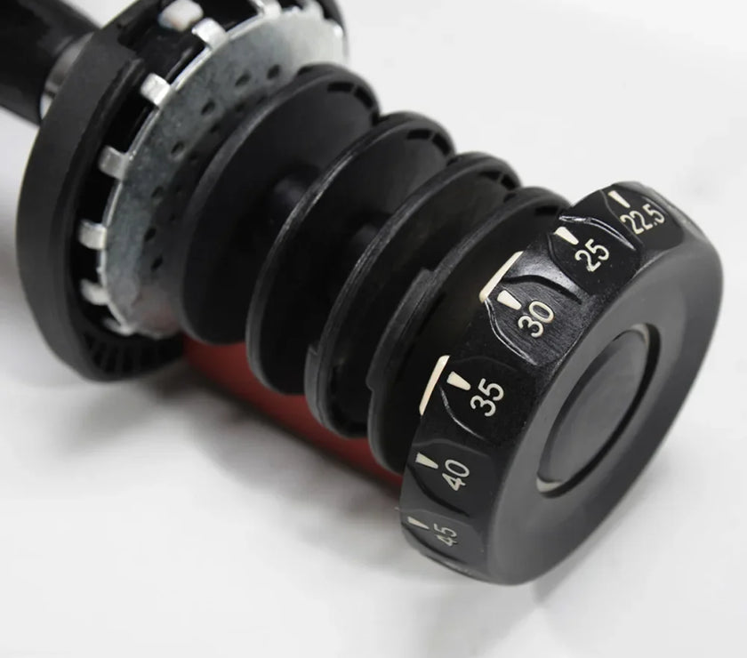 Black adjustable dumbbell on a white background
