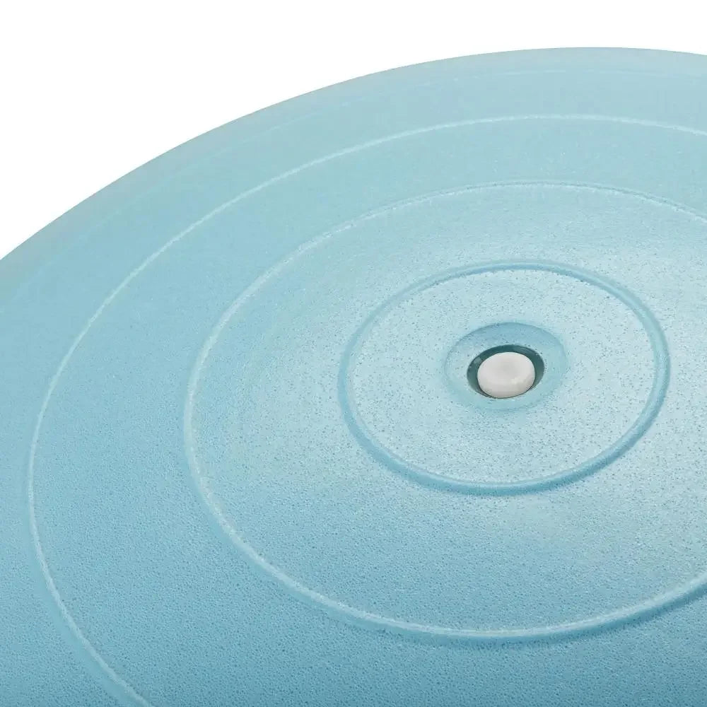 Close-up of a blue circular object with concentric circles and a central hole.
