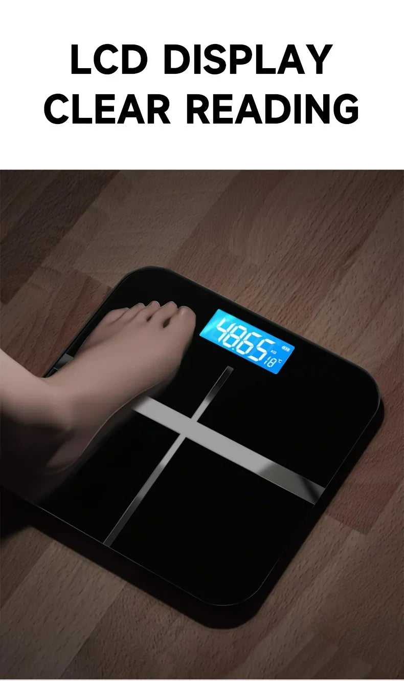 Digital bathroom scale with a foot on it, displaying weight on a wooden floor.
