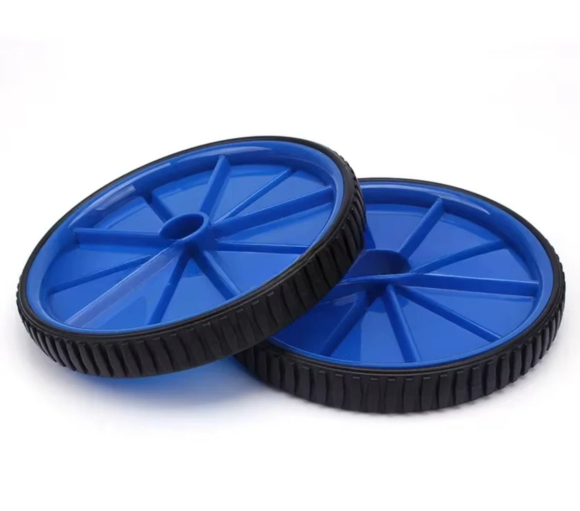 Two blue plastic wheels with black rims on a white background